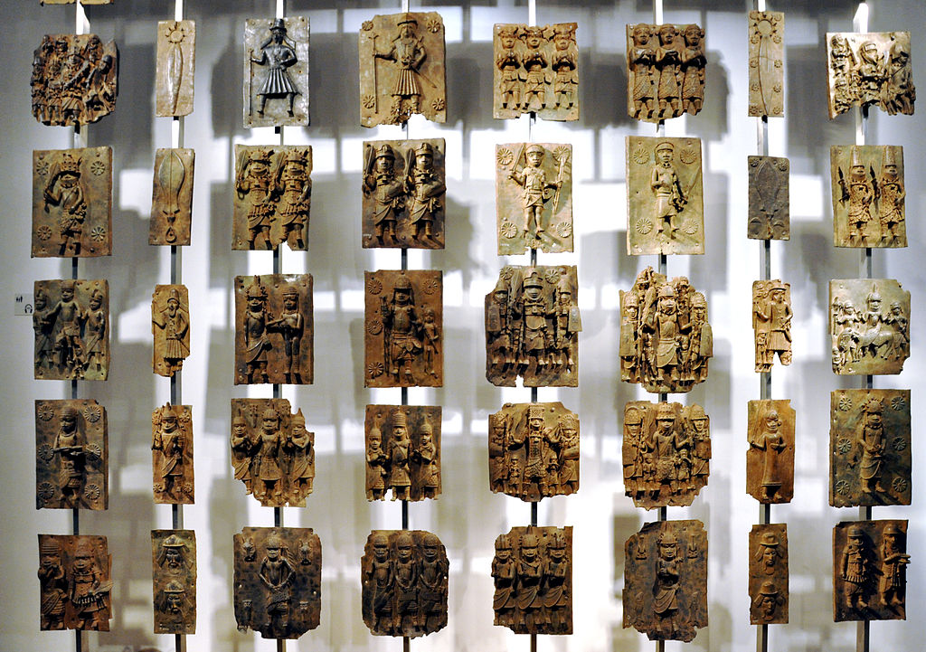 1024px-Cast_brass_plaques_from_Benin_City_at_British_Museum.jpg