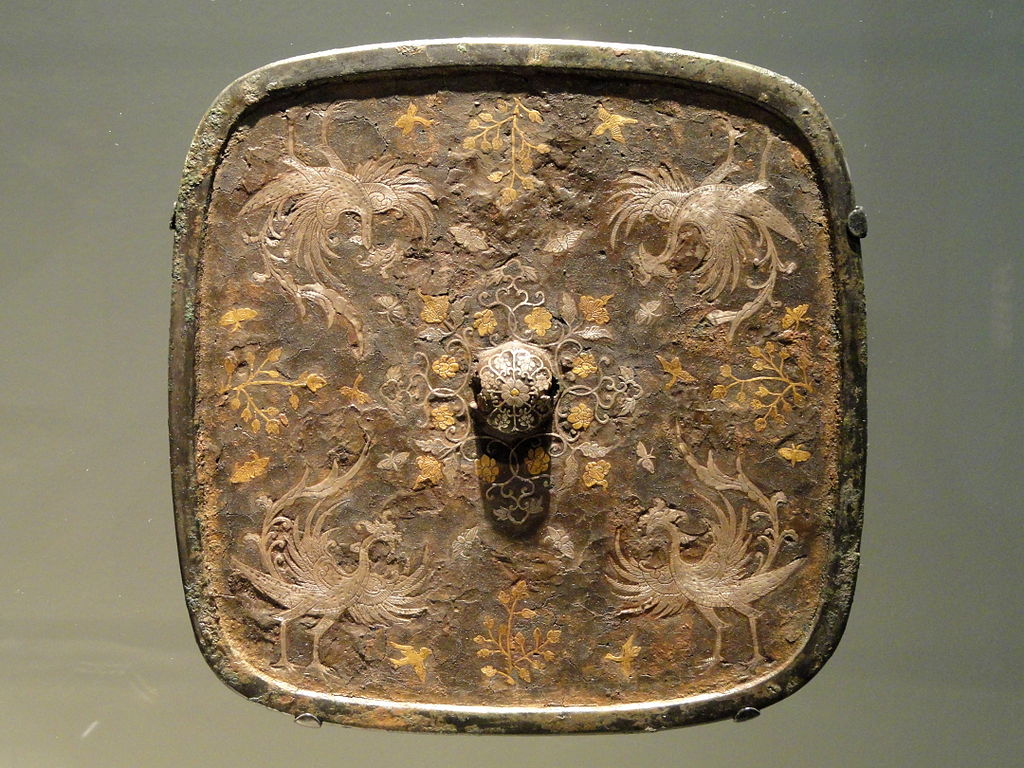 1024px-Mirror,_square_with_floral_medallionTang_dynasty,_7th-th_century_AD_-.jpg