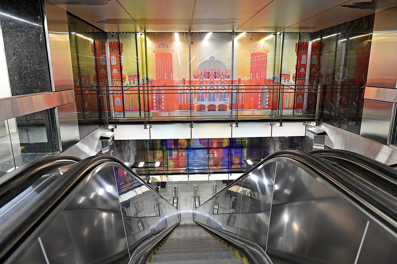 2018Petrovsky_park_metro_station_-_escalators_from_above.jpg