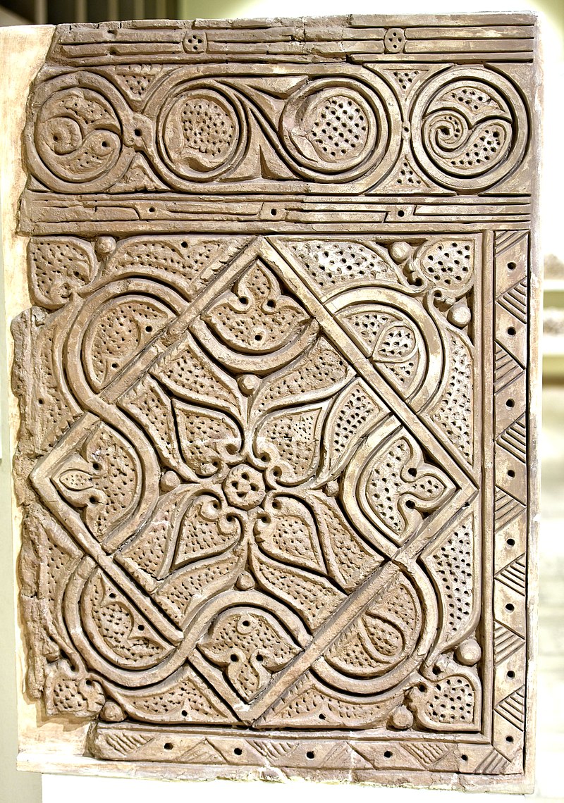 800px-Carved_stucco_panel_from_Samarra,_Iraq,_3rd_century_A.H.,_Iraq_Museum.jpg