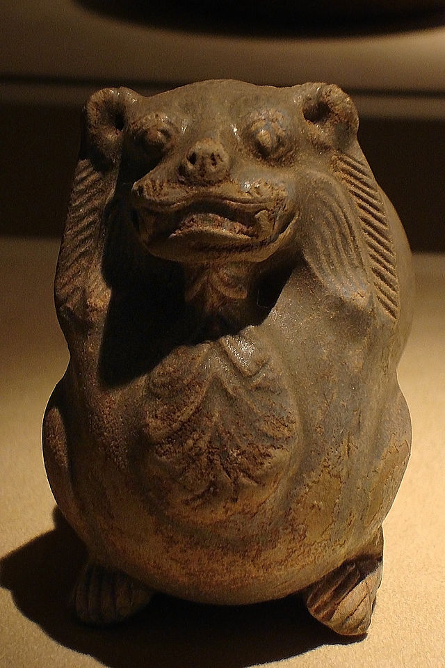 CMOC_Treasures_of_Ancient_China_exhibit_-_celadon_candle_holder,_detail.jpg